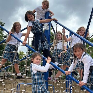 Lourdes girls on climbing frame